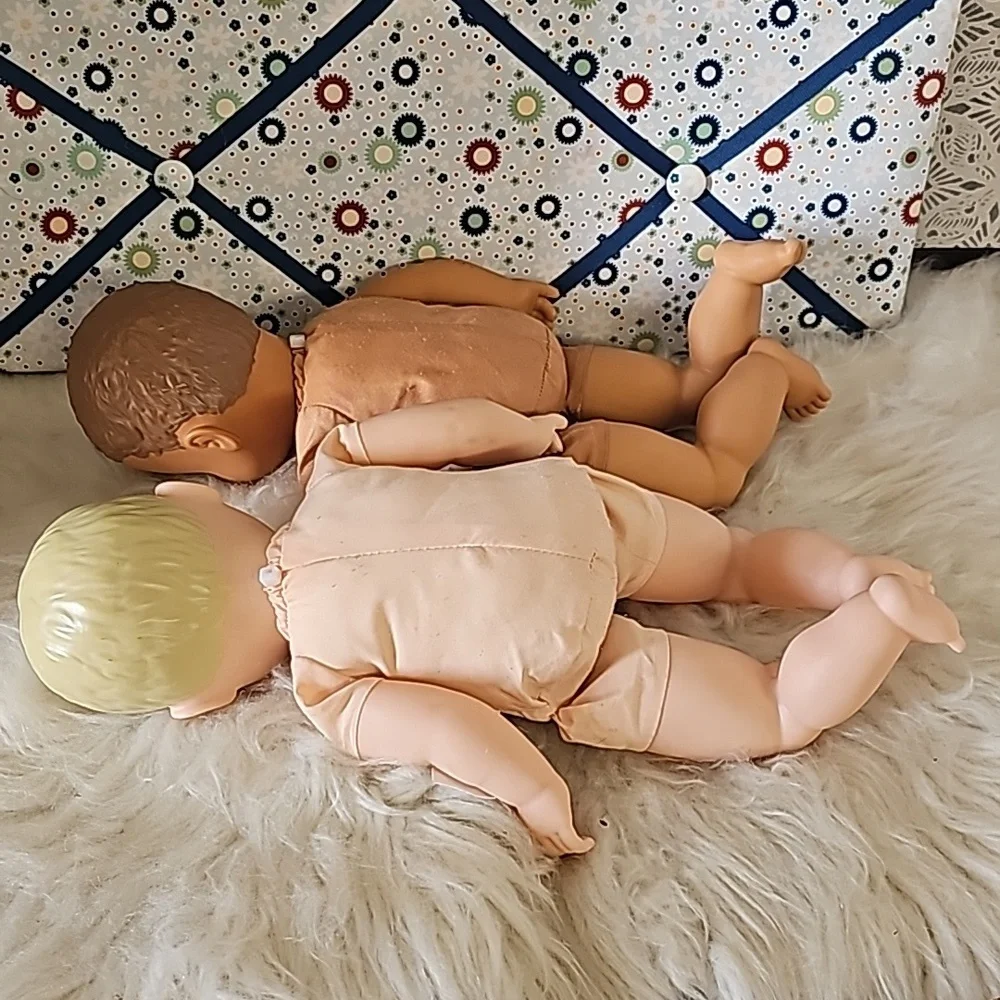 2 cute soft body dolls blonde hair and dark